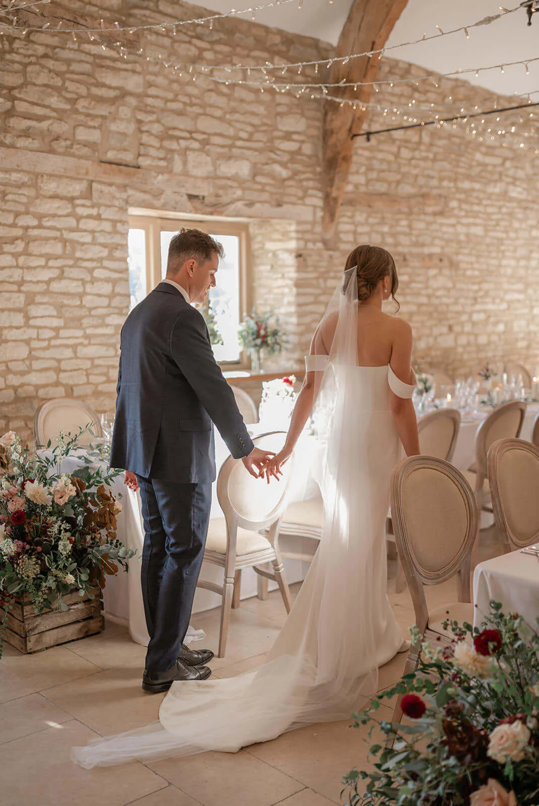 A couple at their indoor reception at Caswell House